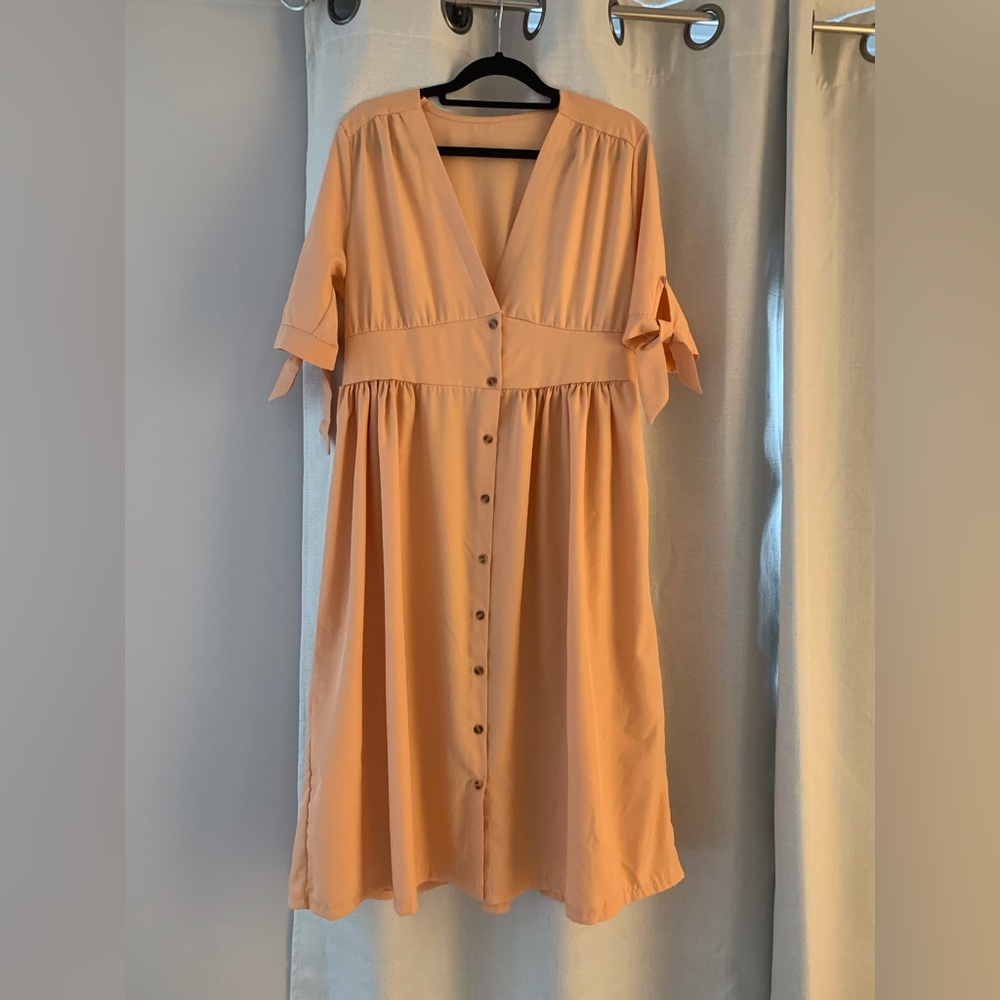 Dress size Medium. Super cute!